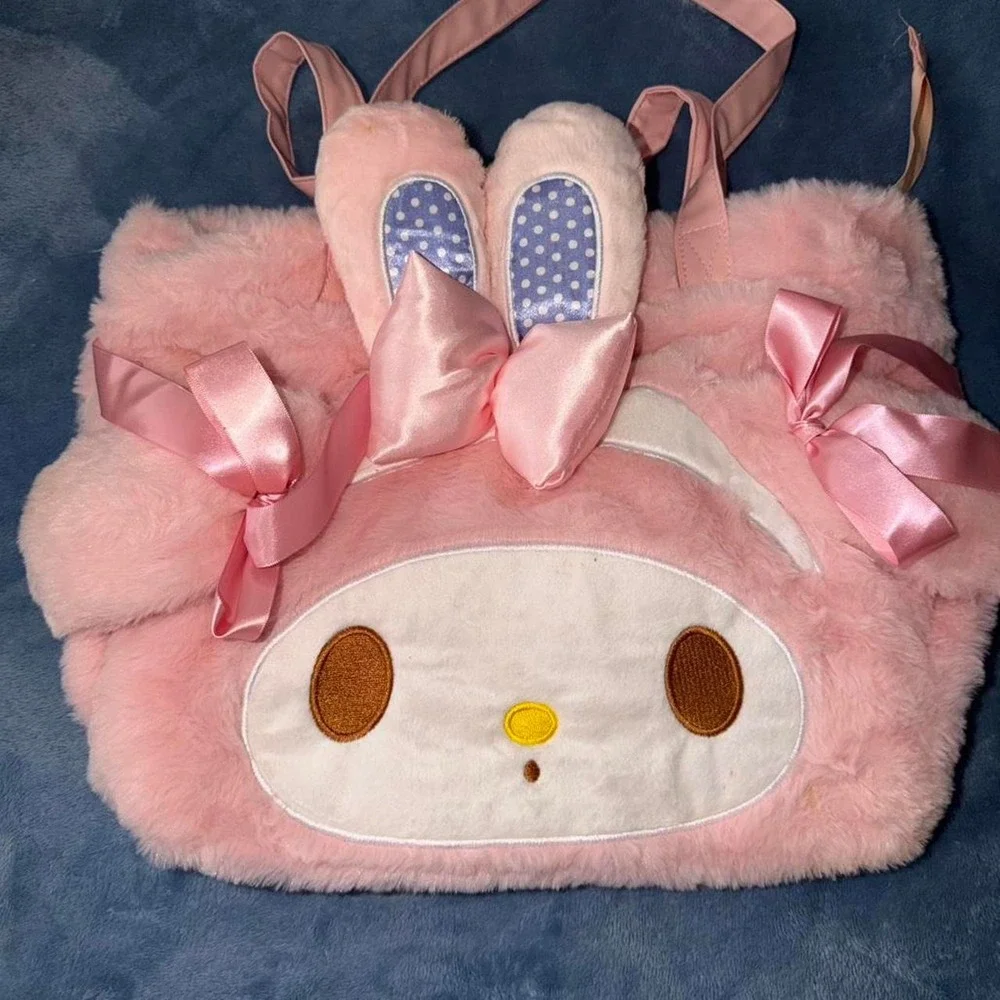 My Melody pink backpack with bow and ribbon details and pack of pens